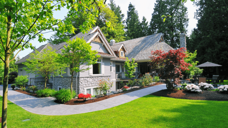 A House With A Driveway And Trees Find Out More At Https://Onemorestarmedia.com Find Out More At Https://Onemorestarmedia.com