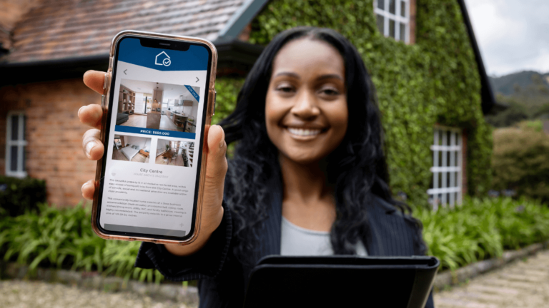 Real Estate Showing A Listing On Mobile Phone Www.onemorestarmedia.com